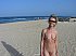 Stripped nudists on beach portraits.